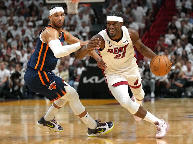 Miami Heat forward Jimmy Butler (22) drives past New York Knicks guard Trevor Keels on May 12, 2023