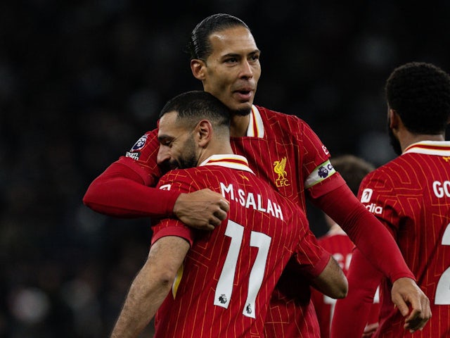 Liverpool's Mohamed Salah celebrates with Virgil van Dijk on December 22, 2024 Liverpool's Mohamed Salah celebrates with Virgil van Dijk on December 22, 2024