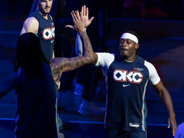 Oklahoma City Thunder guard Luguentz Dort high fives his teammate
