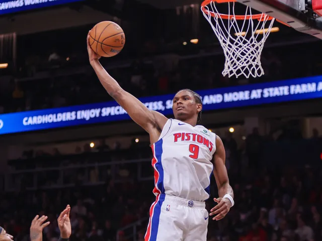 Detroit Pistons guard Ausar Thompson grabs a rebound